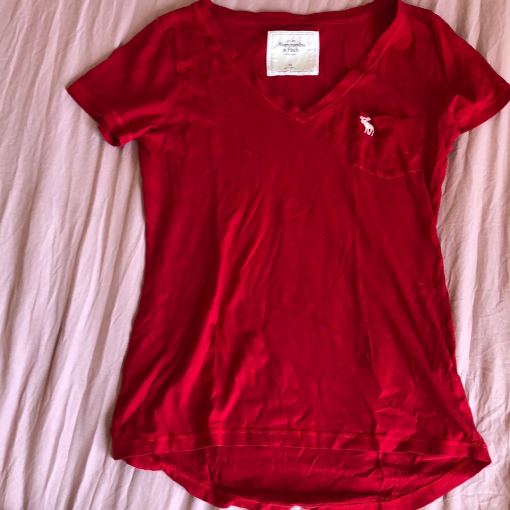 a red short sleeve shirt